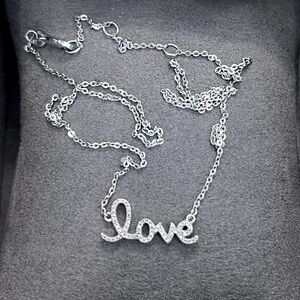 Diamond & Sterling Silver “LOVE” Necklace.